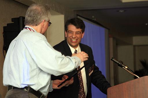 CSSS Vice President  Jim Plaxco accepts the NSS Chapter Award for Public Outreach from National Space Society Vice President for Chapters Arthur Smith at the International Space Development Conference in Los Angeles, California May 6, 2006.