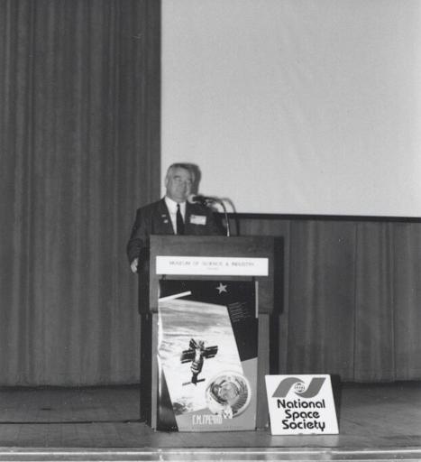 Georgi Grechko speaking to an audience at Chicago's Museum of Science and Industry as part of a CSSS sponsored speaking tour of Chicago in  April 1993.
