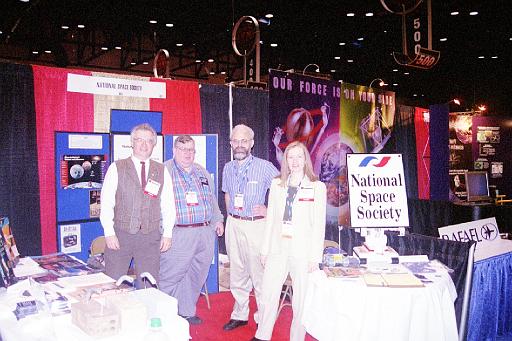 The National Space Society booth at the 2002 World Space Congress. Left to right: CSSS Jim Plaxco, Larry Ahearn, Bruce MacKenzie, Marianne Dyson.