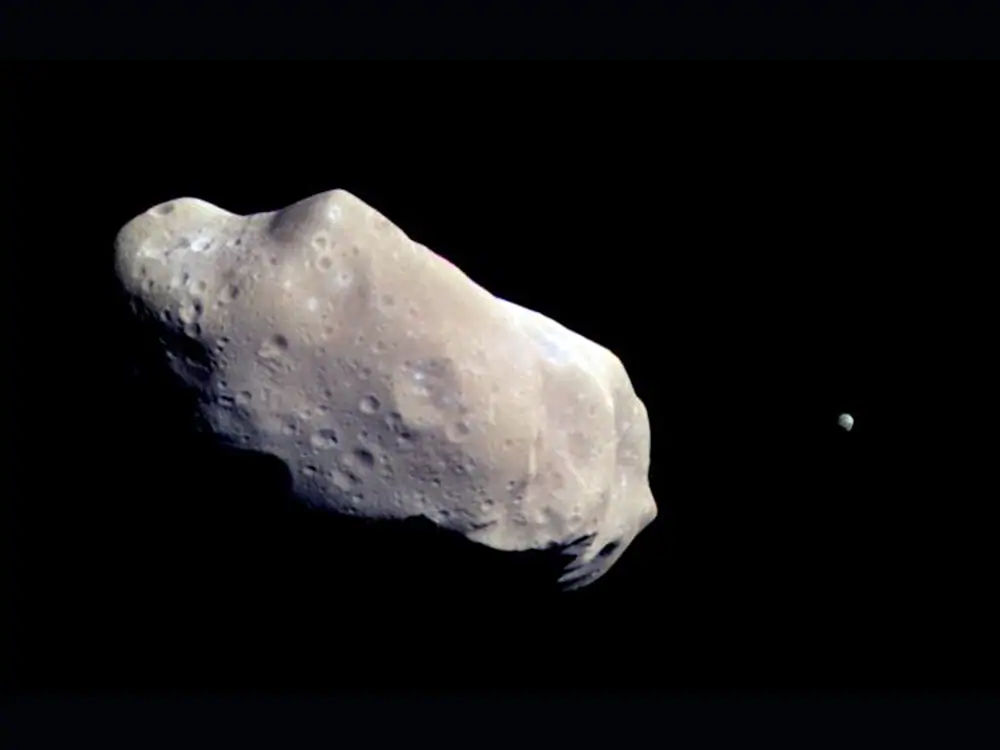 Asteroid Ida and its moon Dactyl as imaged by the Galileo spacecraft in 1993.